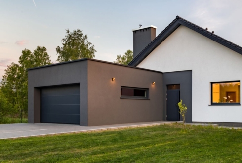 Insulated and weatherproof garage doors for energy efficiency.