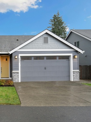 Affordable Wayne Dalton doors enhance curb appeal in a modern Edmonton home exterior Affordable Wayne Dalton doors enhance curb appeal in a modern Edmonton home exterior