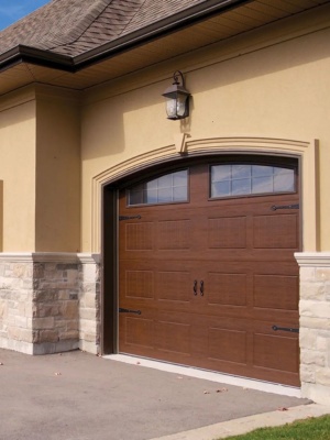 Custom steel garage door installation in a modern home in Edmonton showcasing durability and style Custom steel garage door installation in a modern home in Edmonton showcasing durability and style