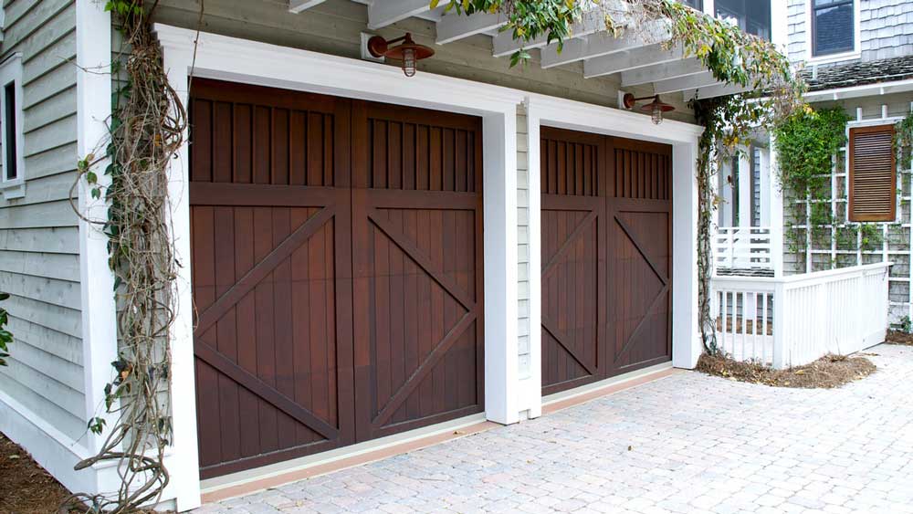 Repairing wooden garage doors in Edmonton with quality service and expertise for household needs Repairing wooden garage doors in Edmonton with quality service and expertise for household needs