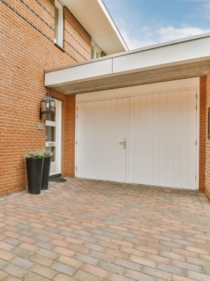 Door opener repair service from Richards Wilcox in Edmonton at a residential property during daylight hours Door opener repair service from Richards Wilcox in Edmonton at a residential property during daylight hours